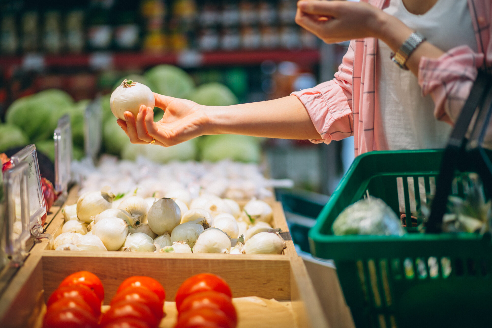 Woman buying at grocery store